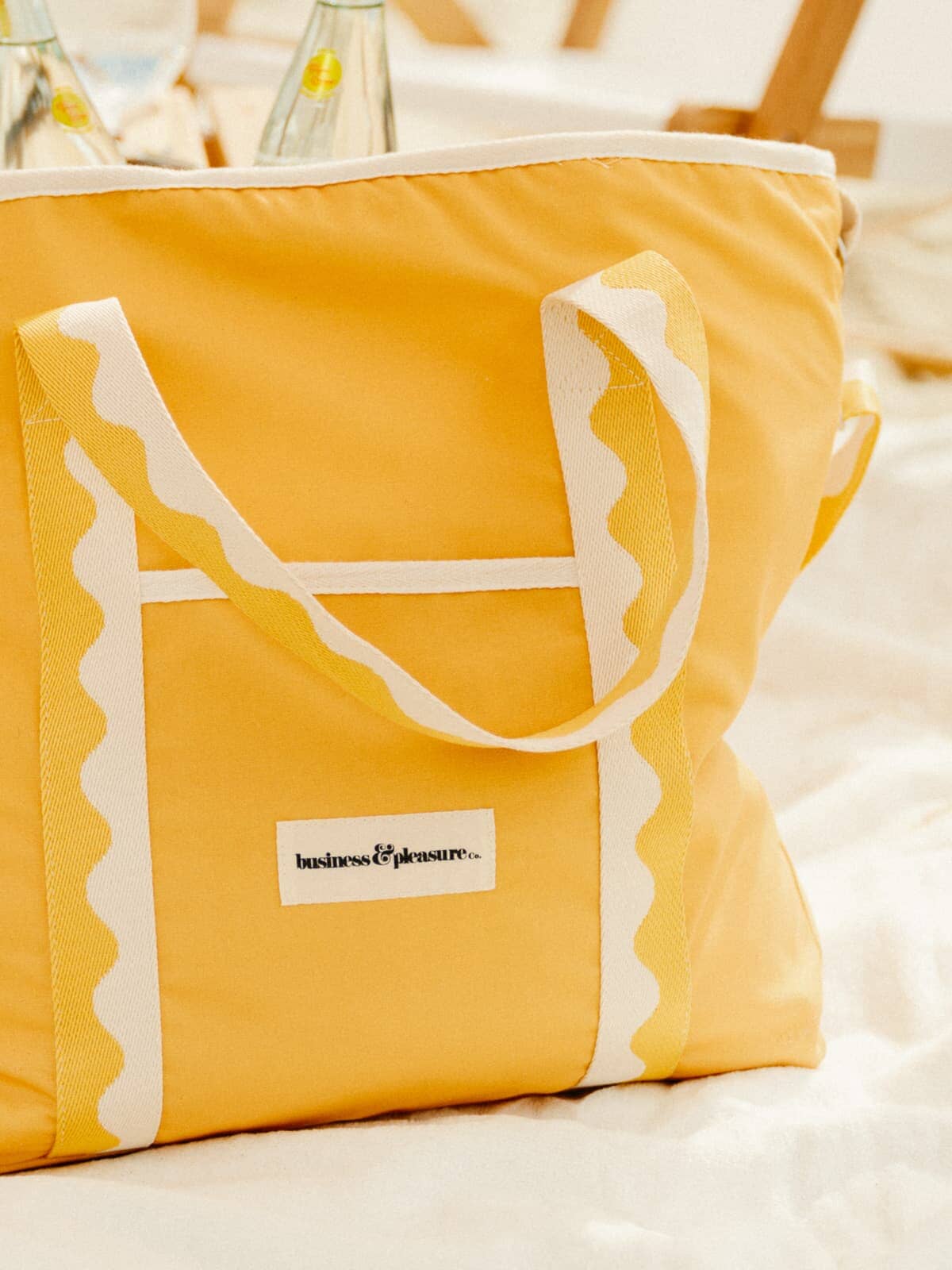 Riviera mimosa cooler tote on the beach